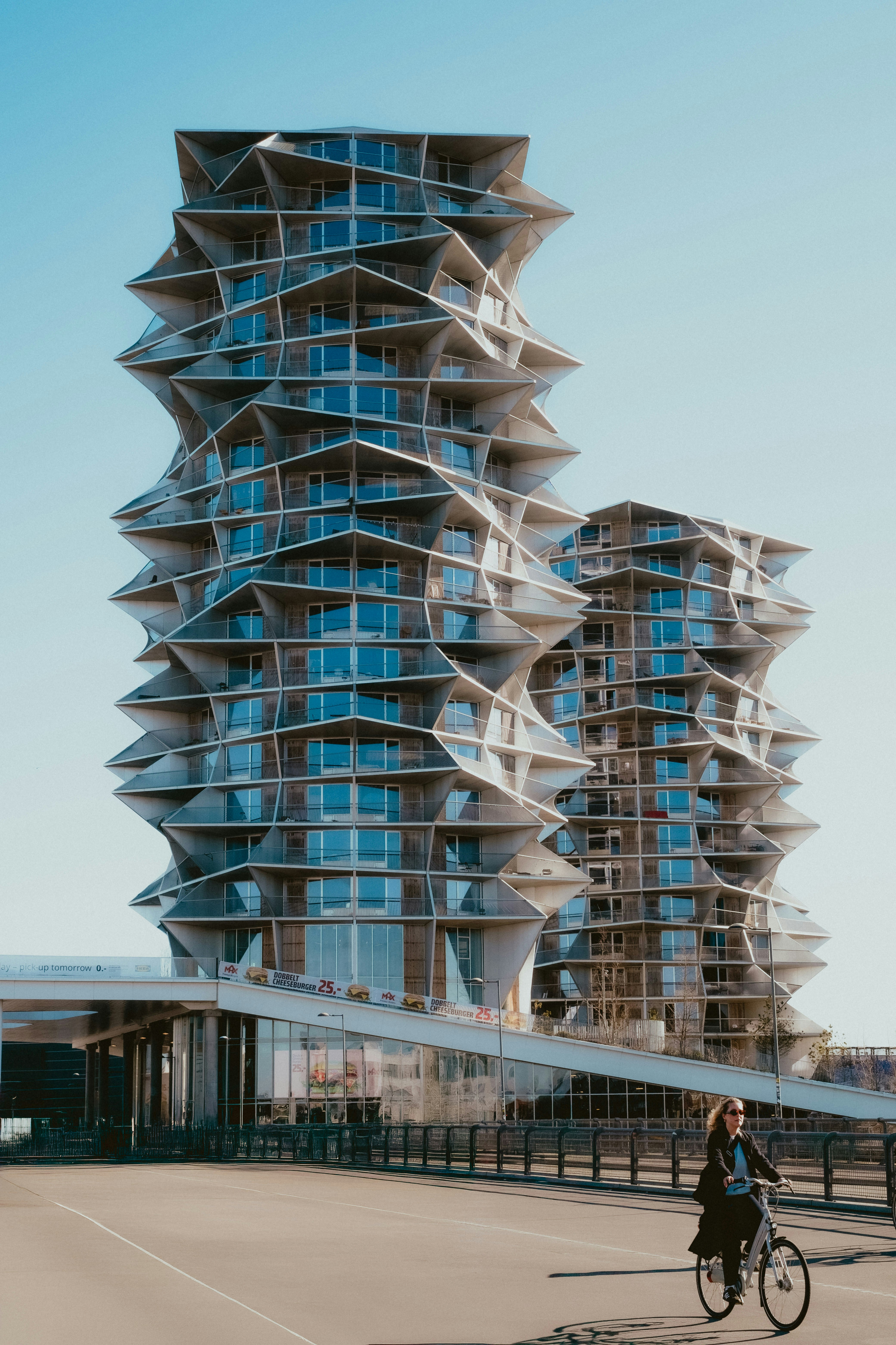 Modern apartment buildings with unique geometric facades.