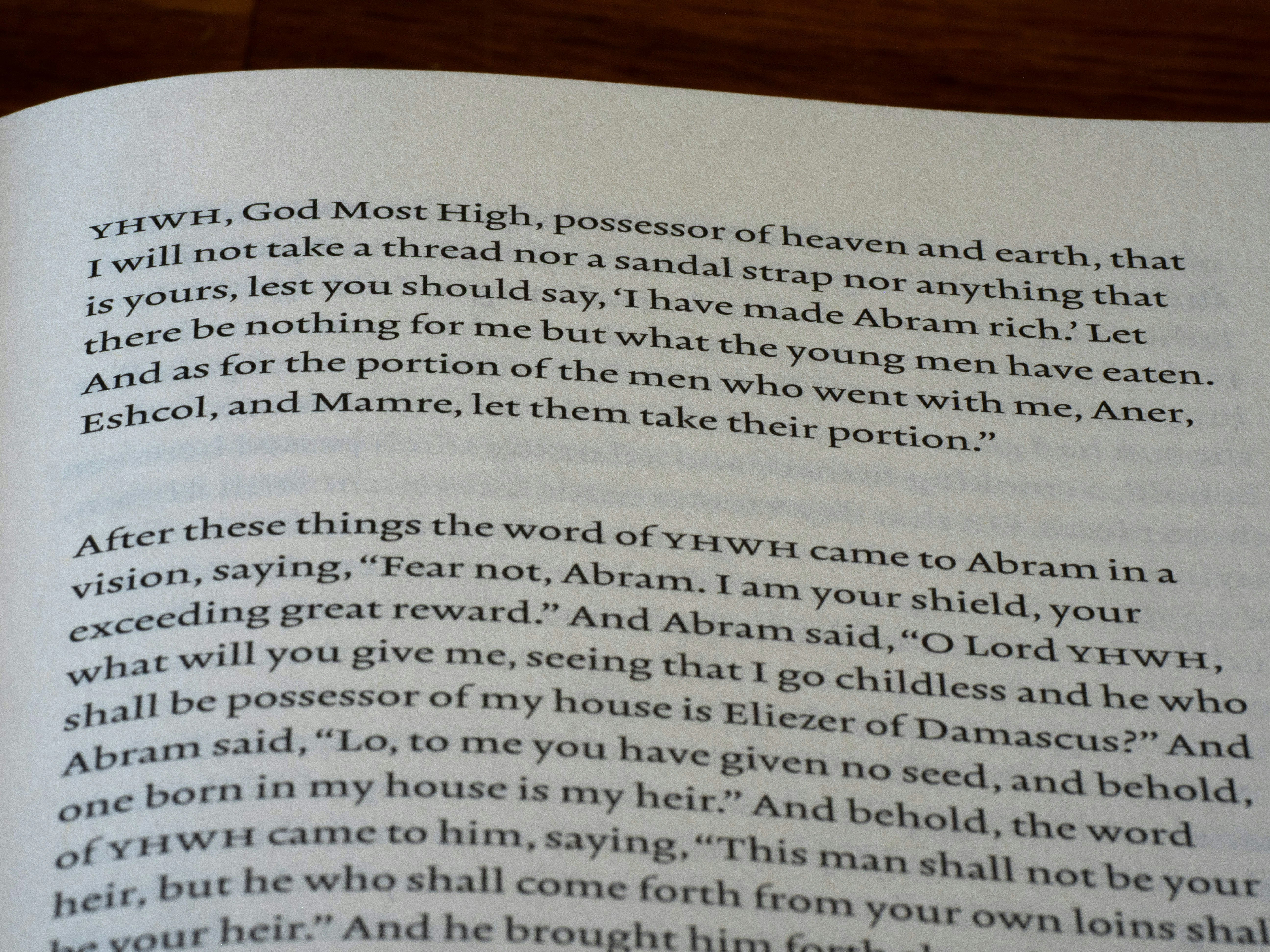 Close-up of text from a book with scripture.