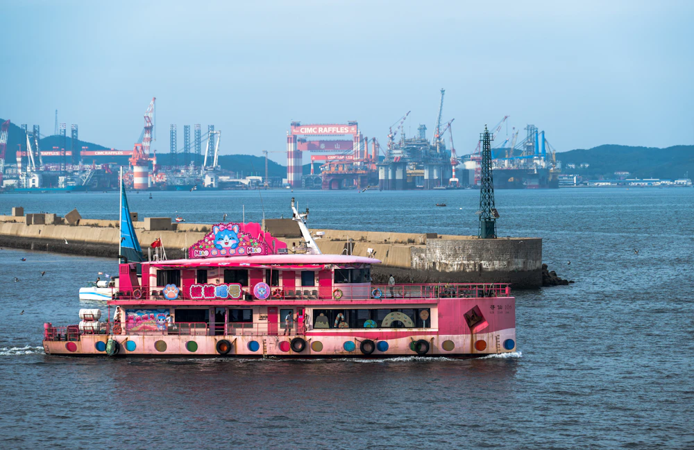 Pink boat on the water
