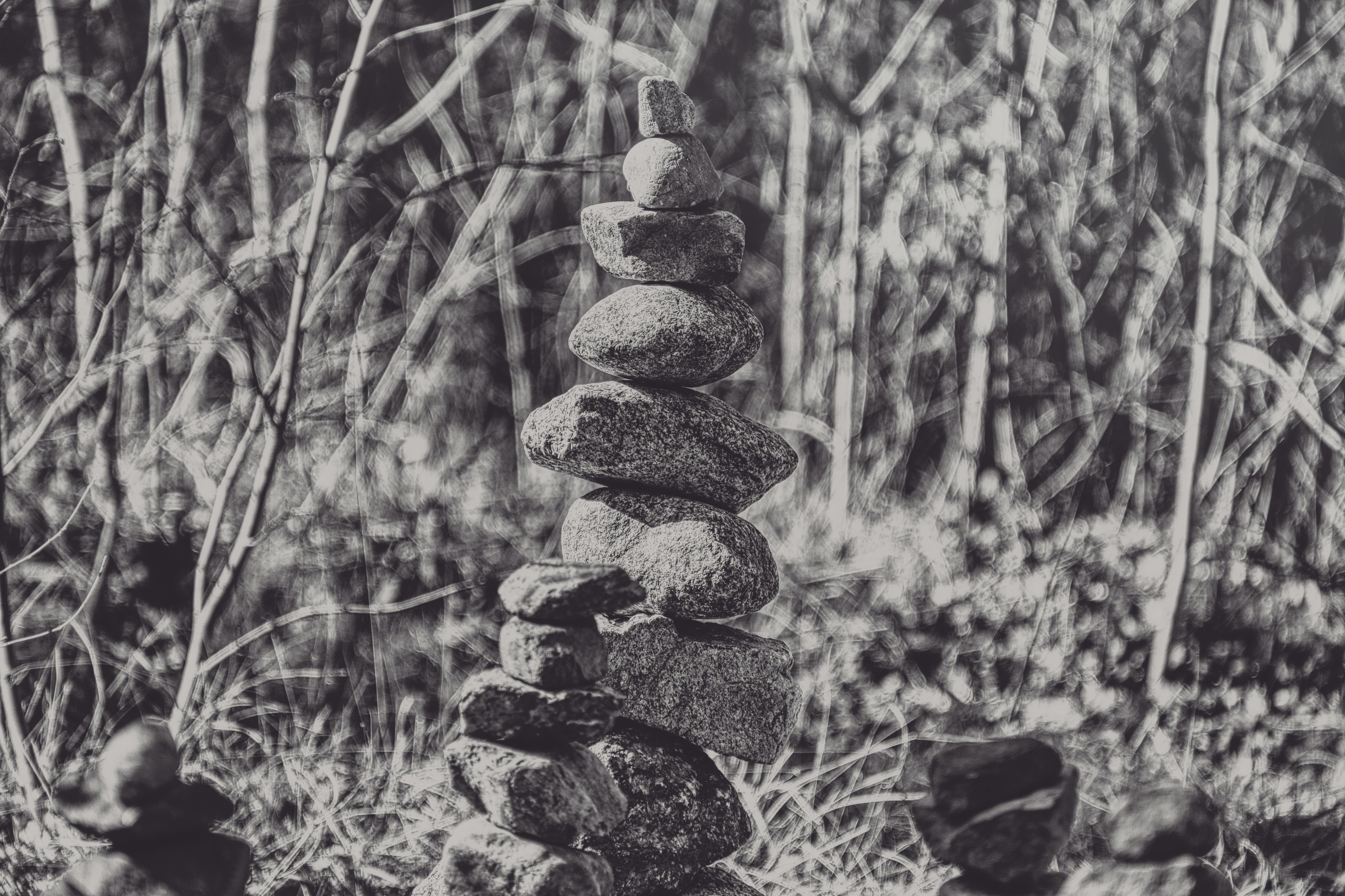 Stack of balanced stones in a natural setting.