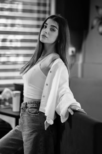 Young woman in casual clothes posing indoors