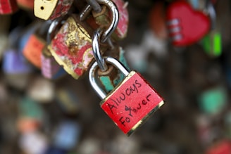 Red padlock with "always forever" written on it.