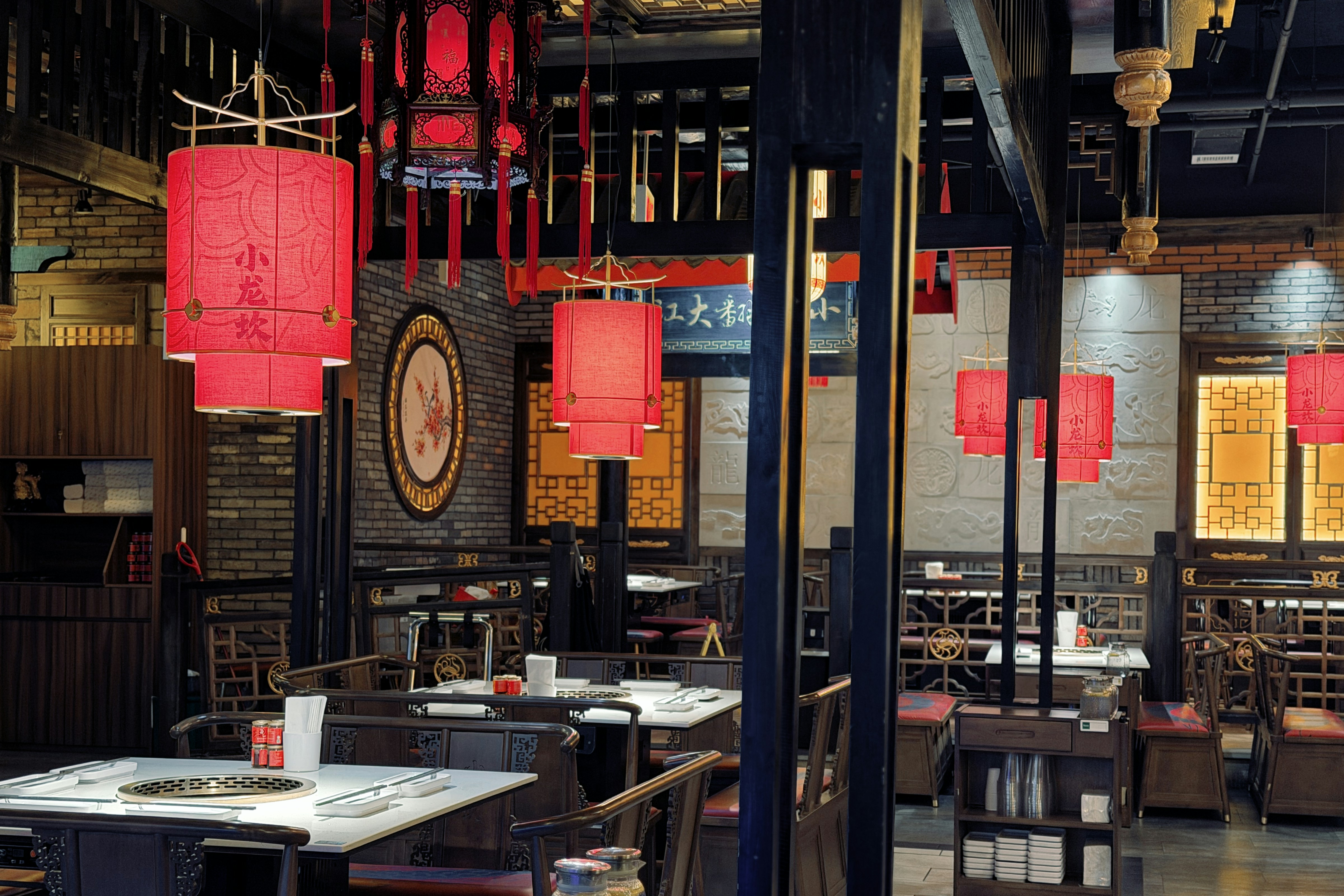 Chinese hotpot restaurant interior with warm lanterns at Urban Spice Hut