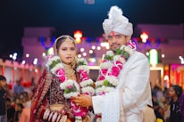 Newlyweds in traditional indian wedding attire