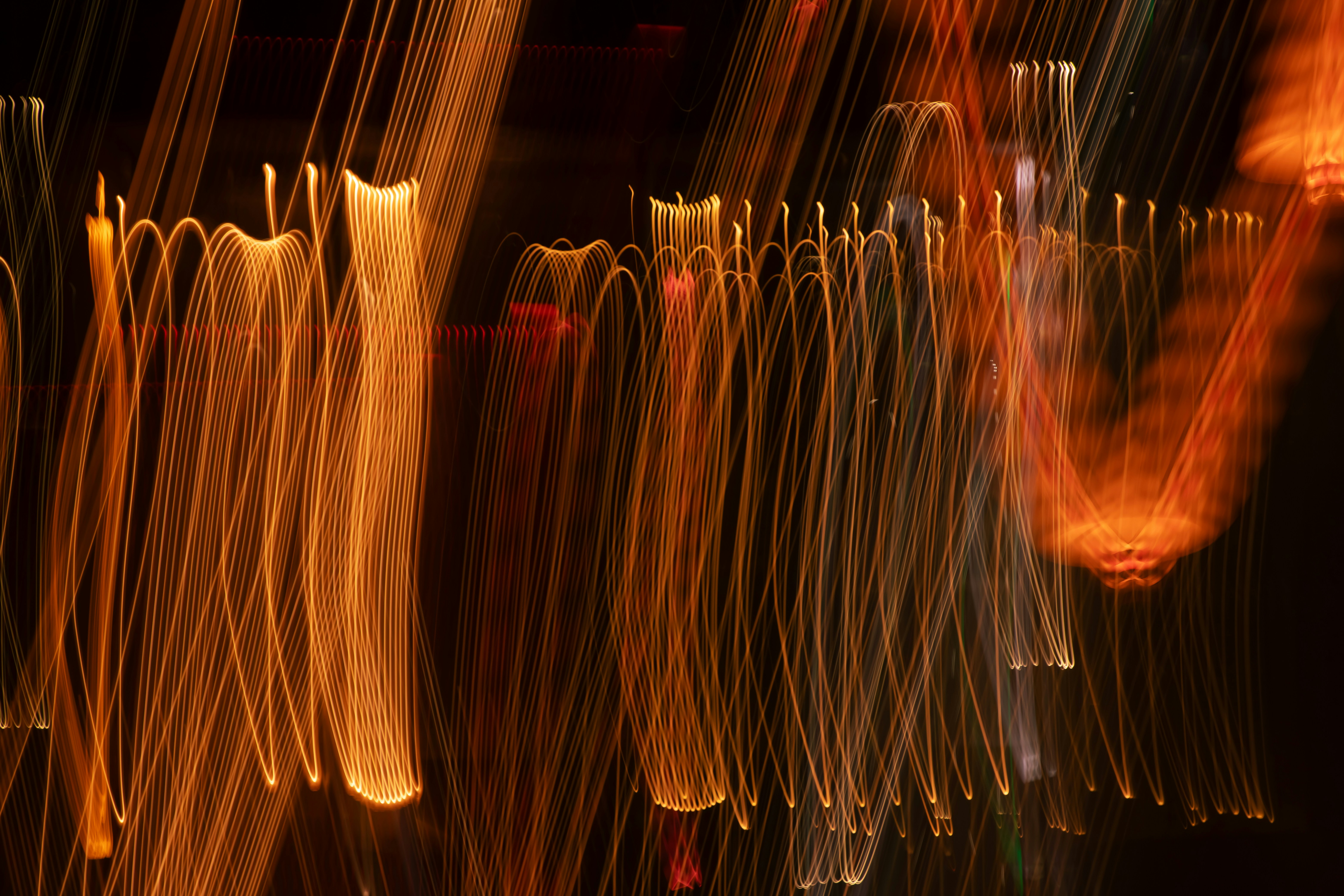 Abstract streaks of orange and yellow light