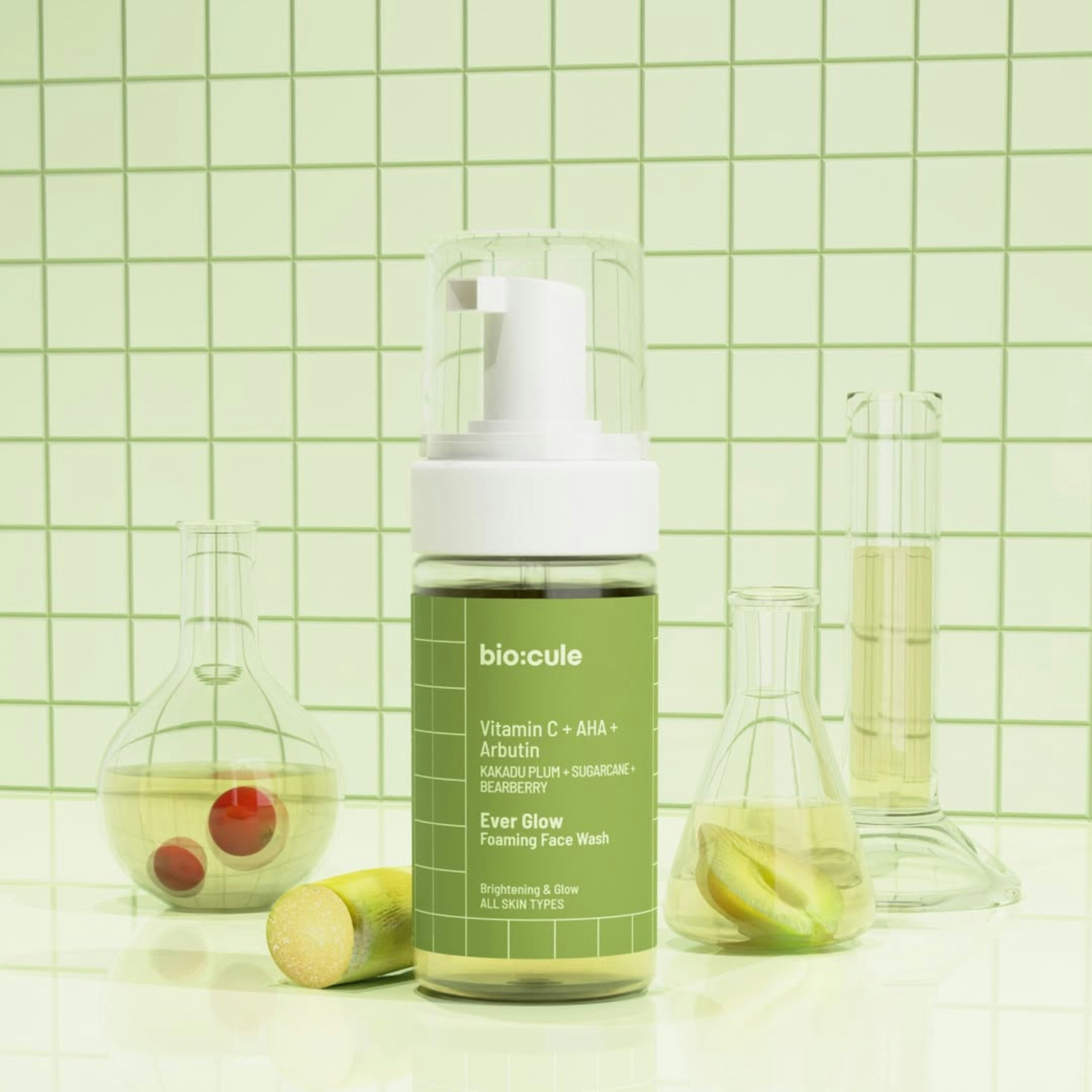 Foaming face wash bottle with skincare ingredients.