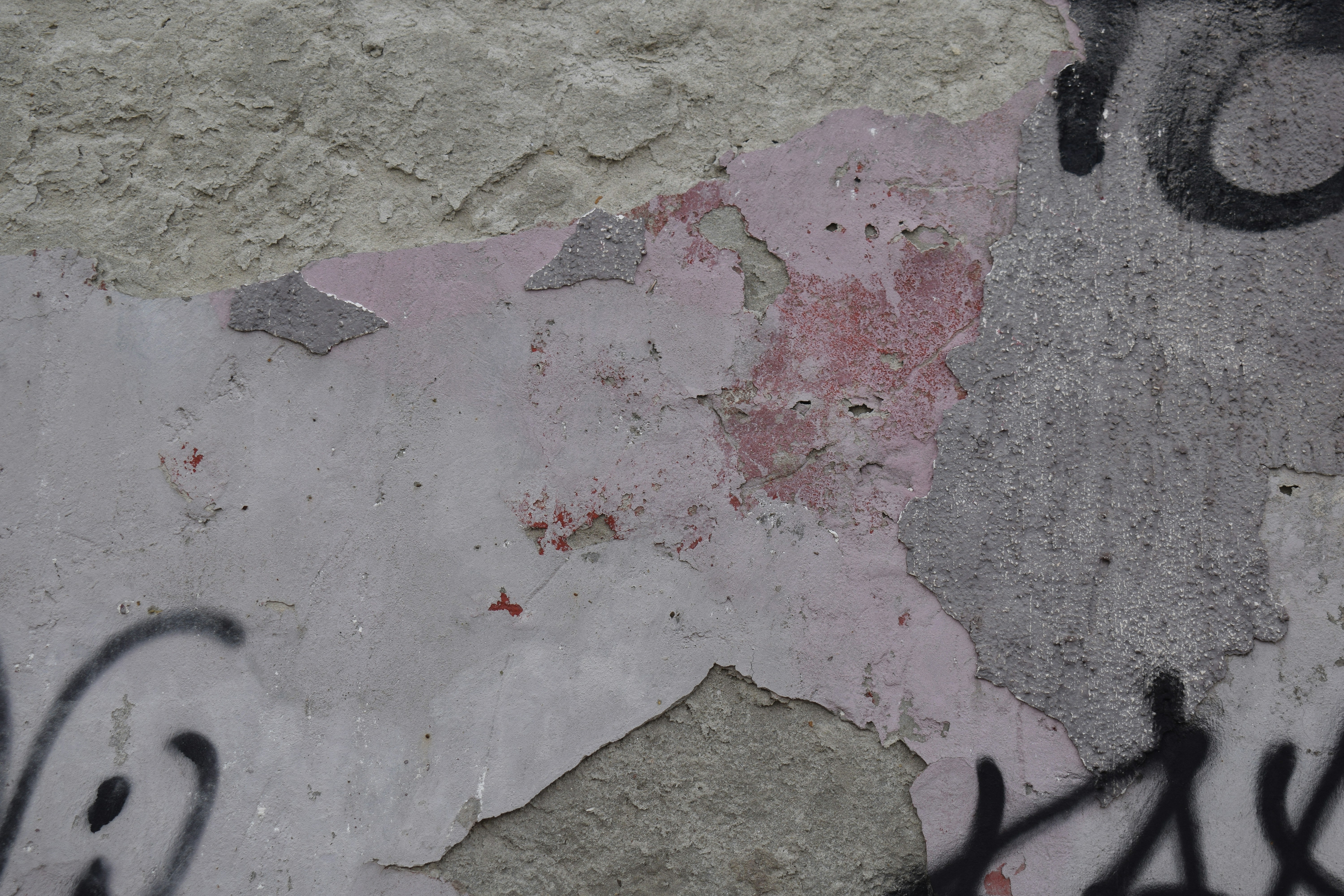 Peeling paint and graffiti on a textured wall photo – Free Background ...