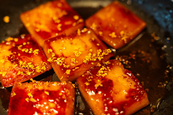 Kuih berkilat bertabur kelapa