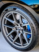 Close-up of a car's performance tire and wheel.