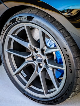 Close-up of a car's performance tire and wheel.