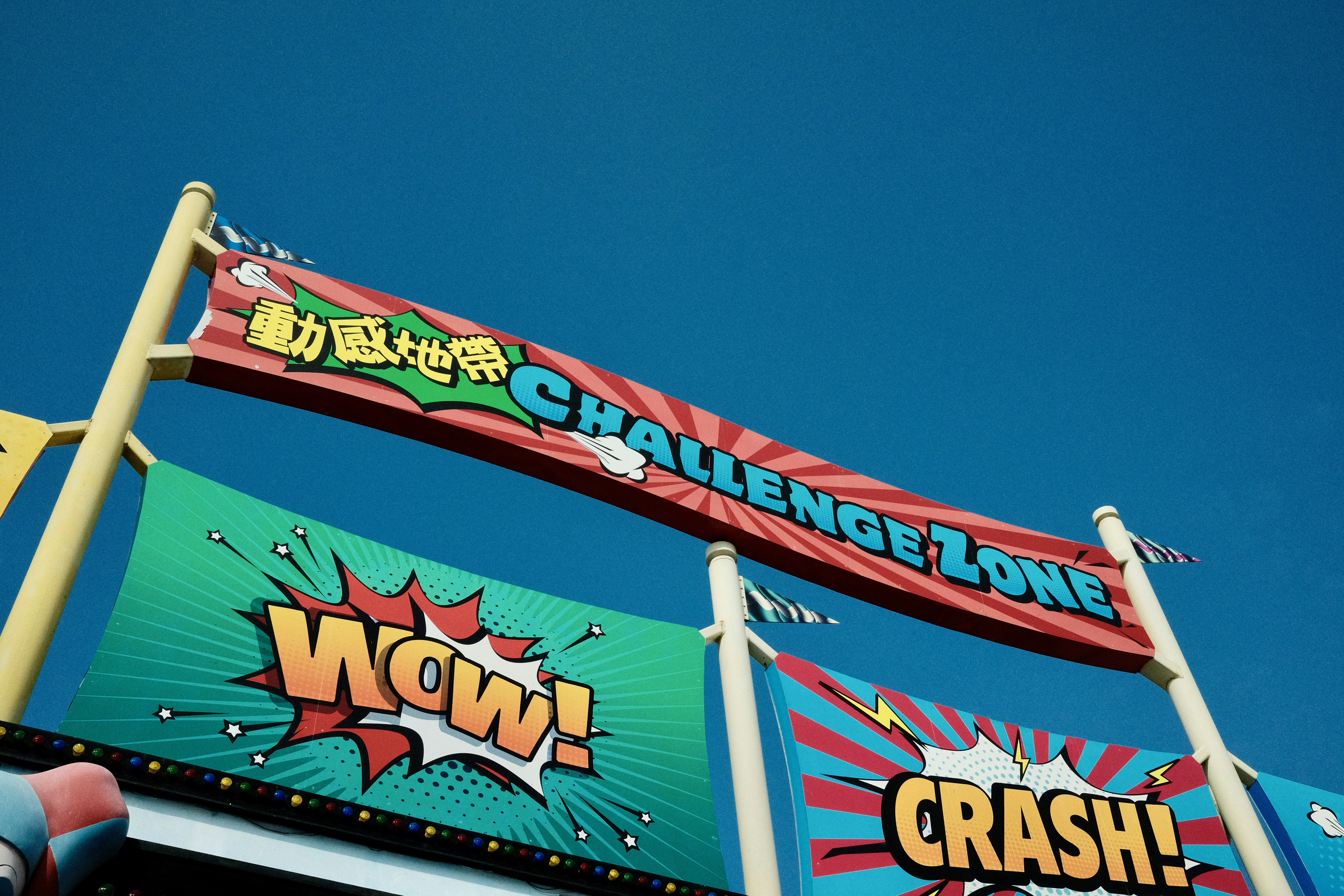 Banners with comic book style text and graphics.