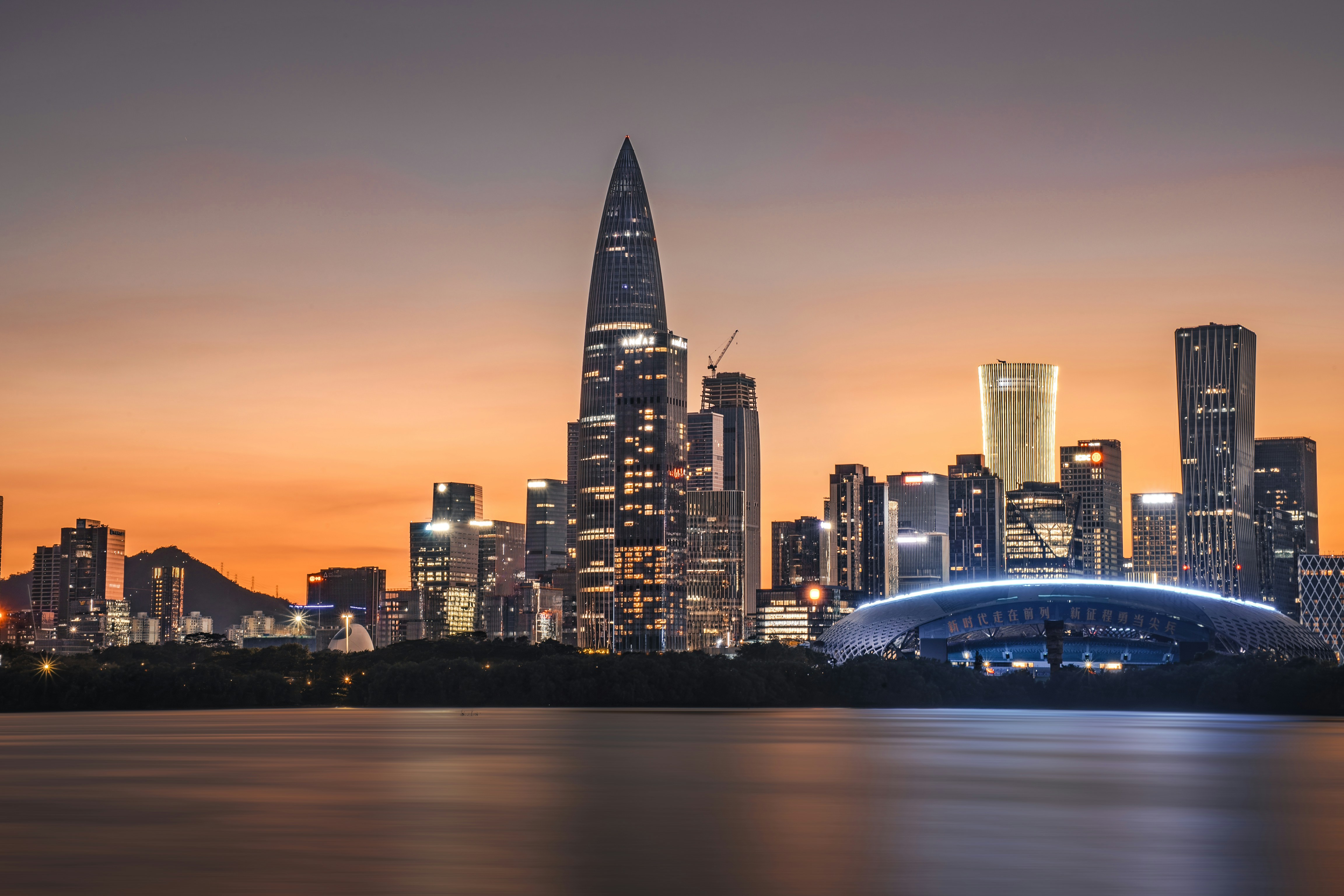 City skyline with skyscrapers at sunset