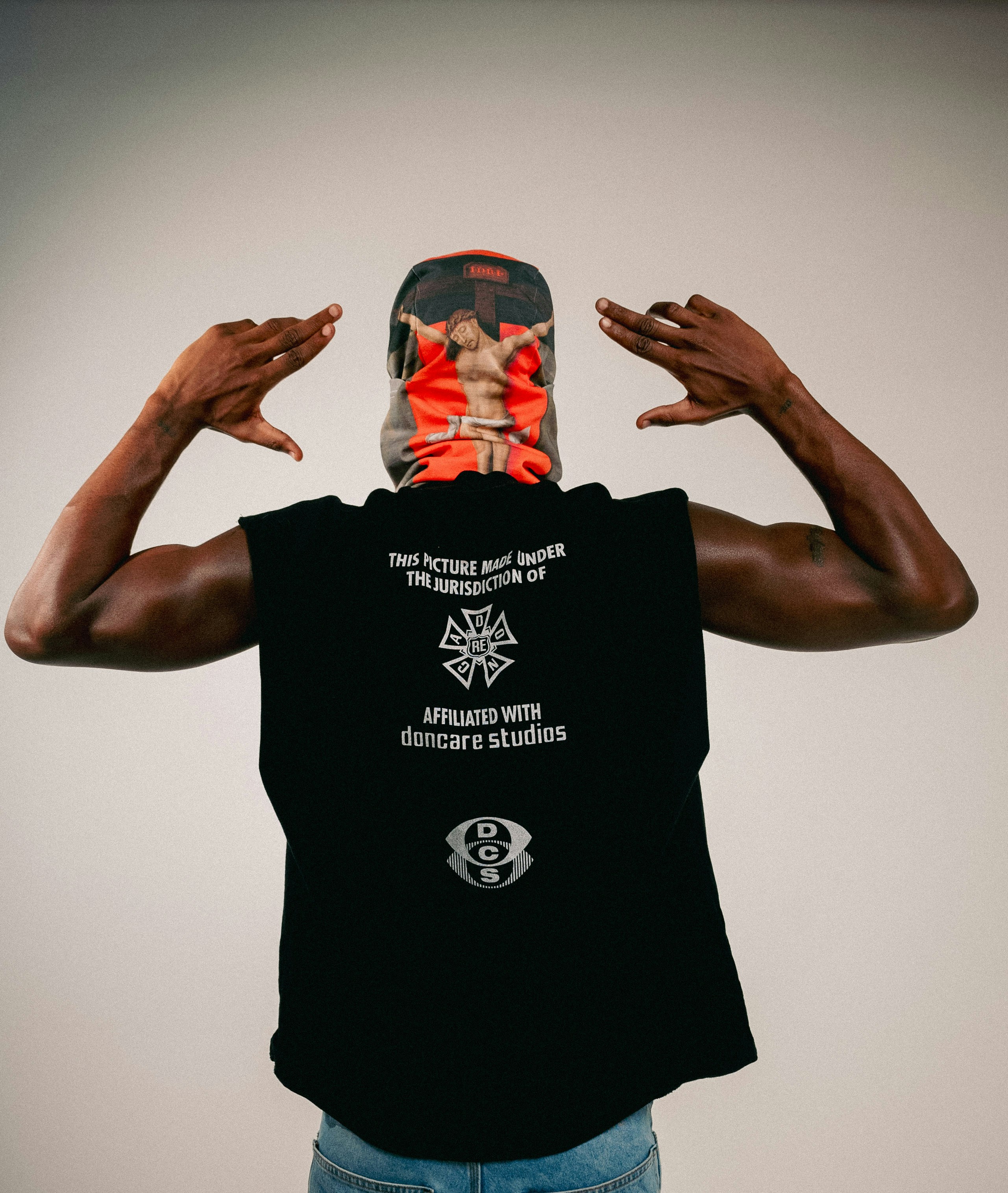 Man with artistic mask and graphic t-shirt