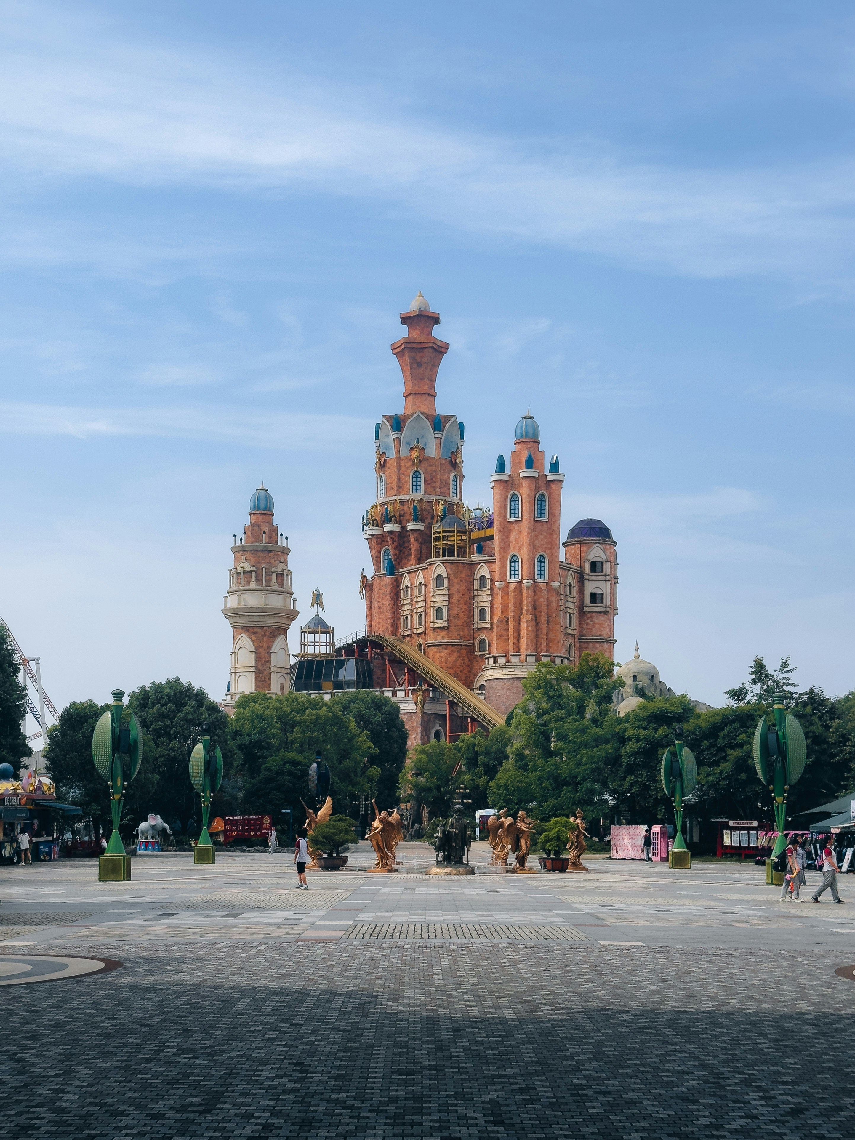 Fantasy castle with towers and blue sky