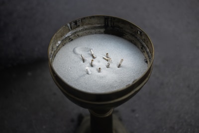 Cigarettes in a sand-filled holder