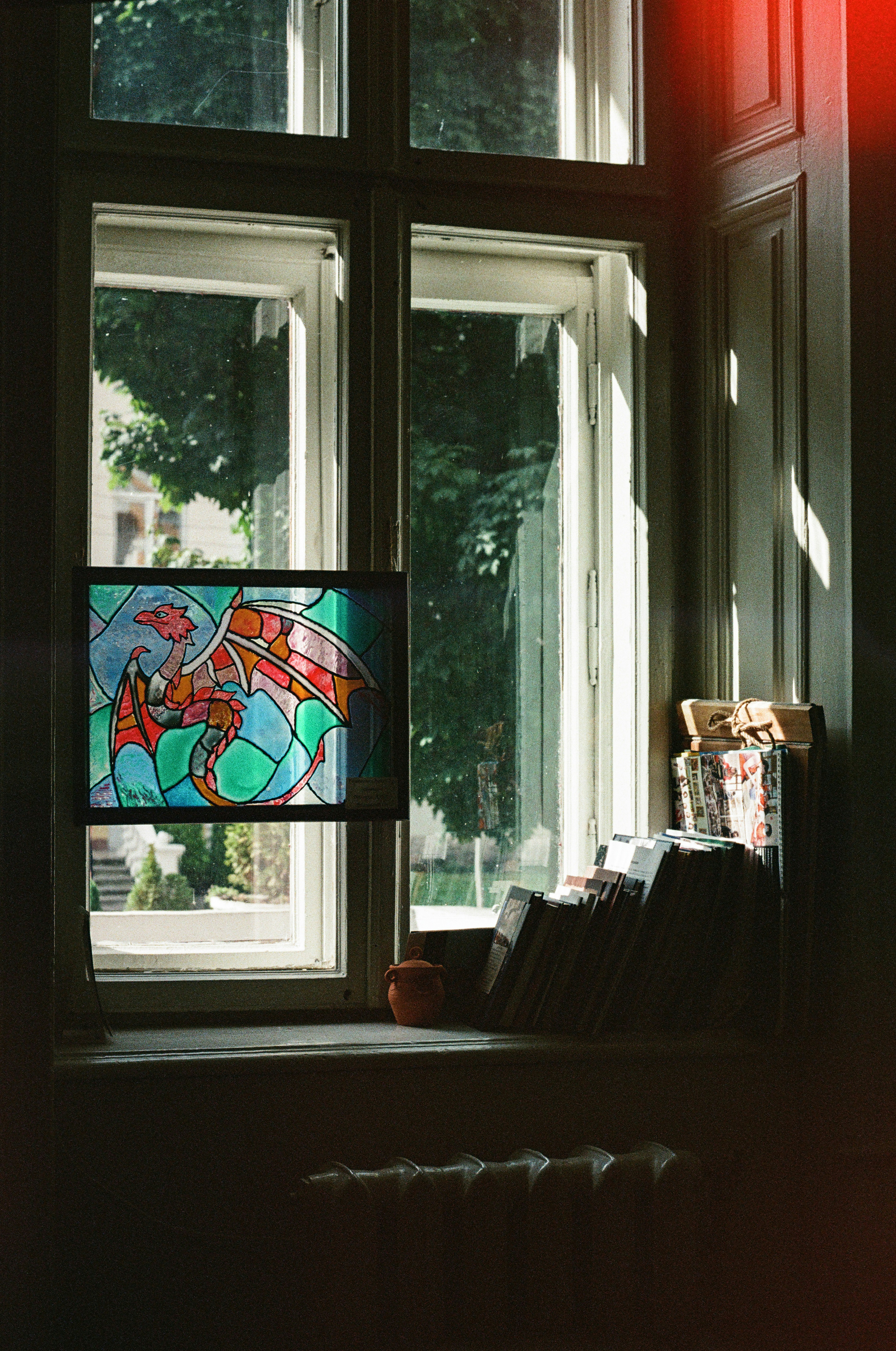 Meditative figure with gentle light between hands, symbolizing awareness and the art of observing without reacting.