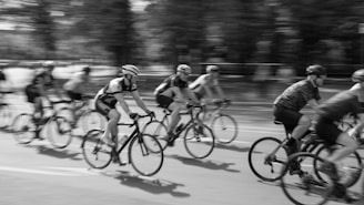 Cyclists racing on a road with motion blur