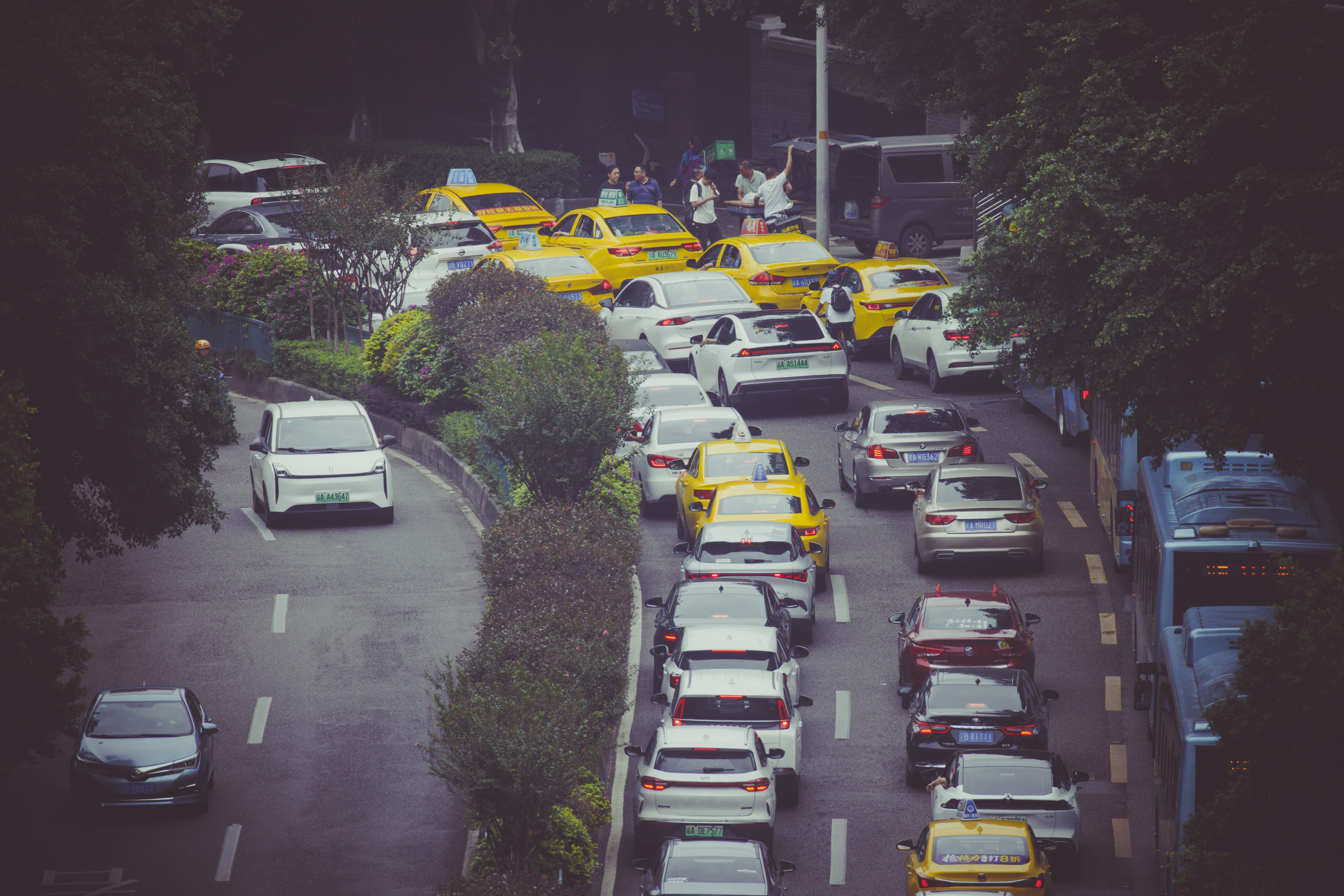 Traffic jam on a busy city street with many cars.