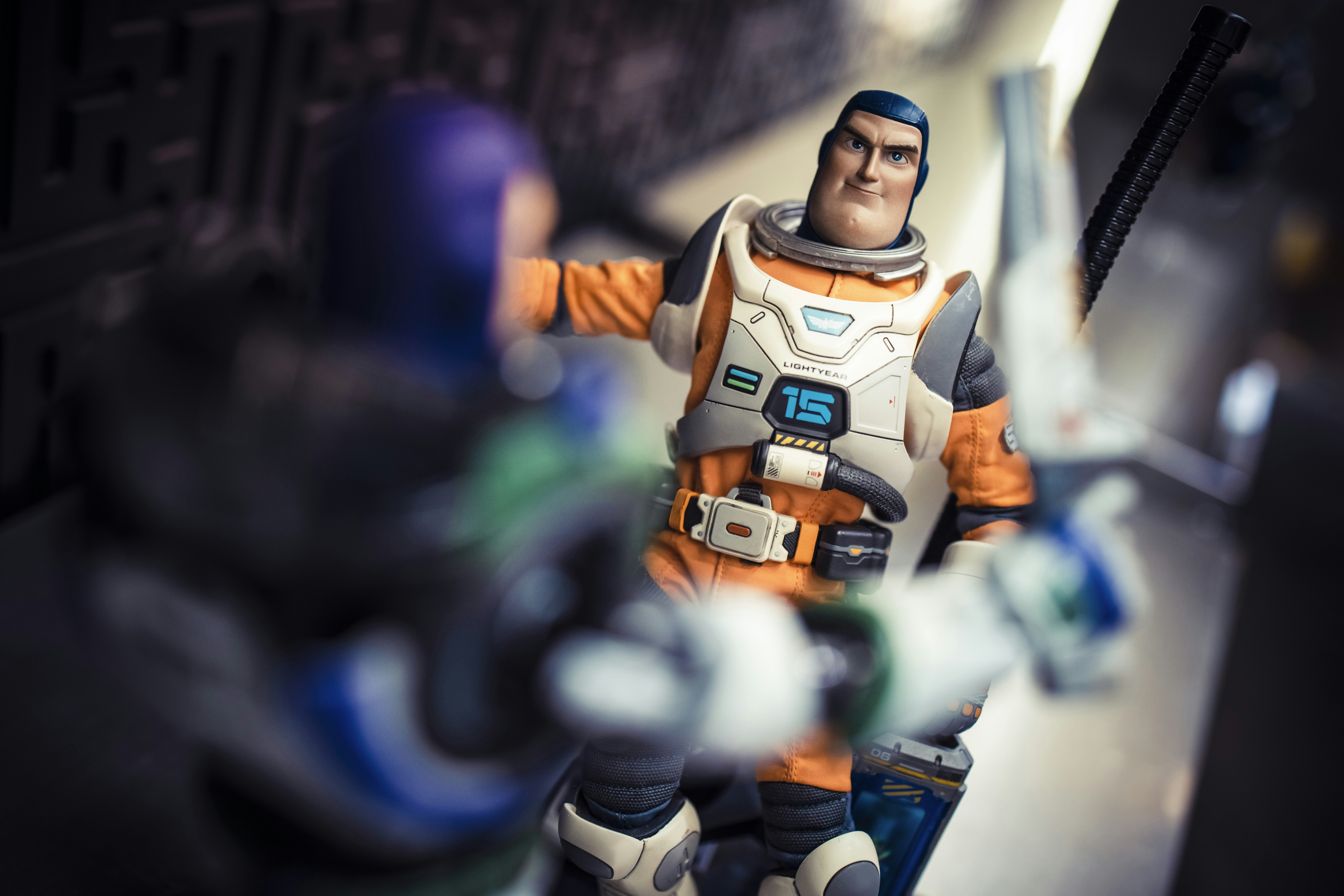 Two action figures in a spaceship setting.