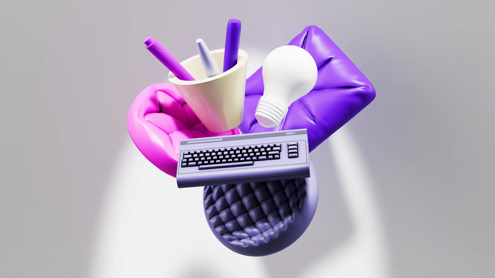 Creative desk objects including a keyboard, lightbulb and pens