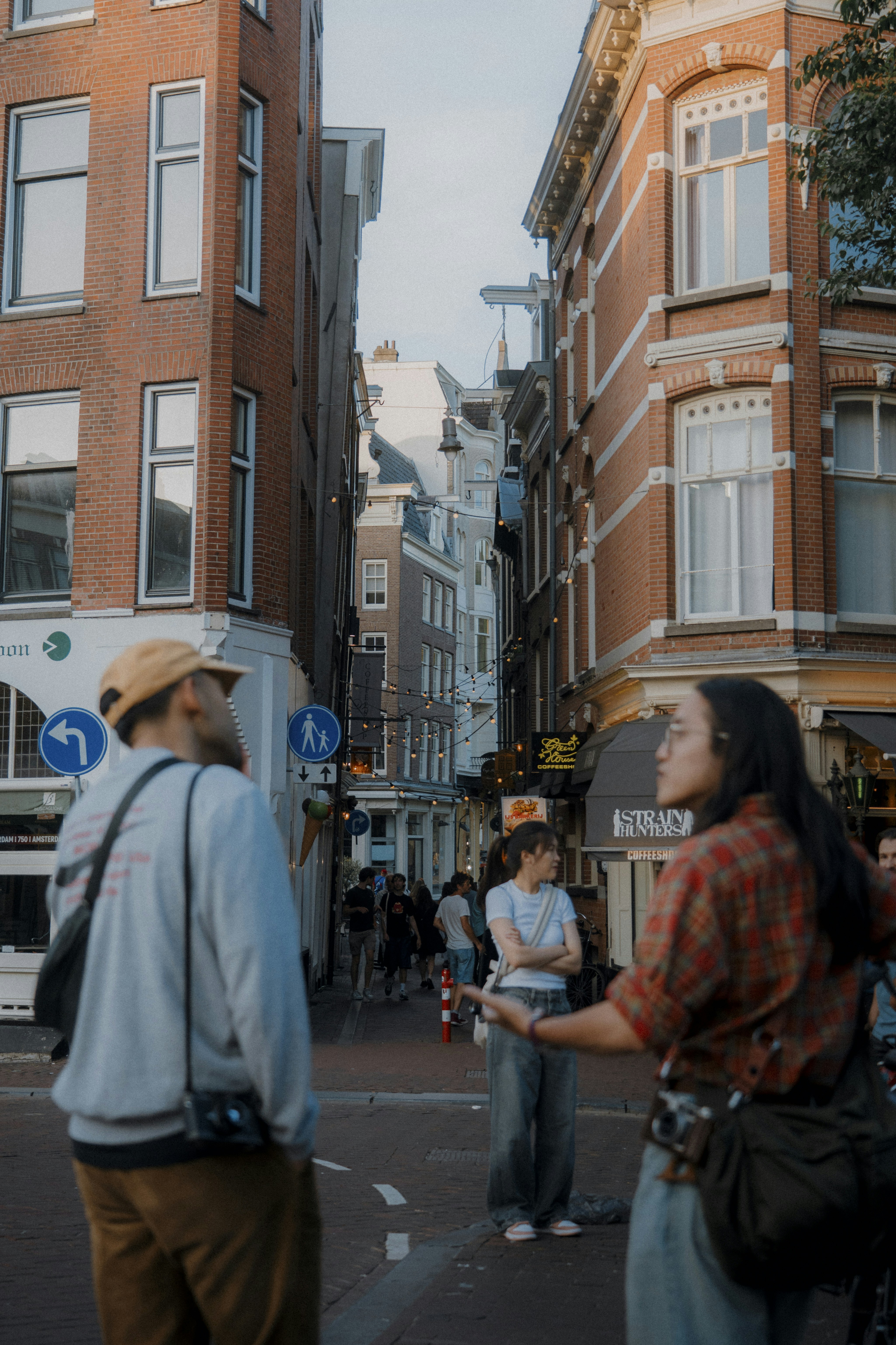 People walking on a street in a european city.