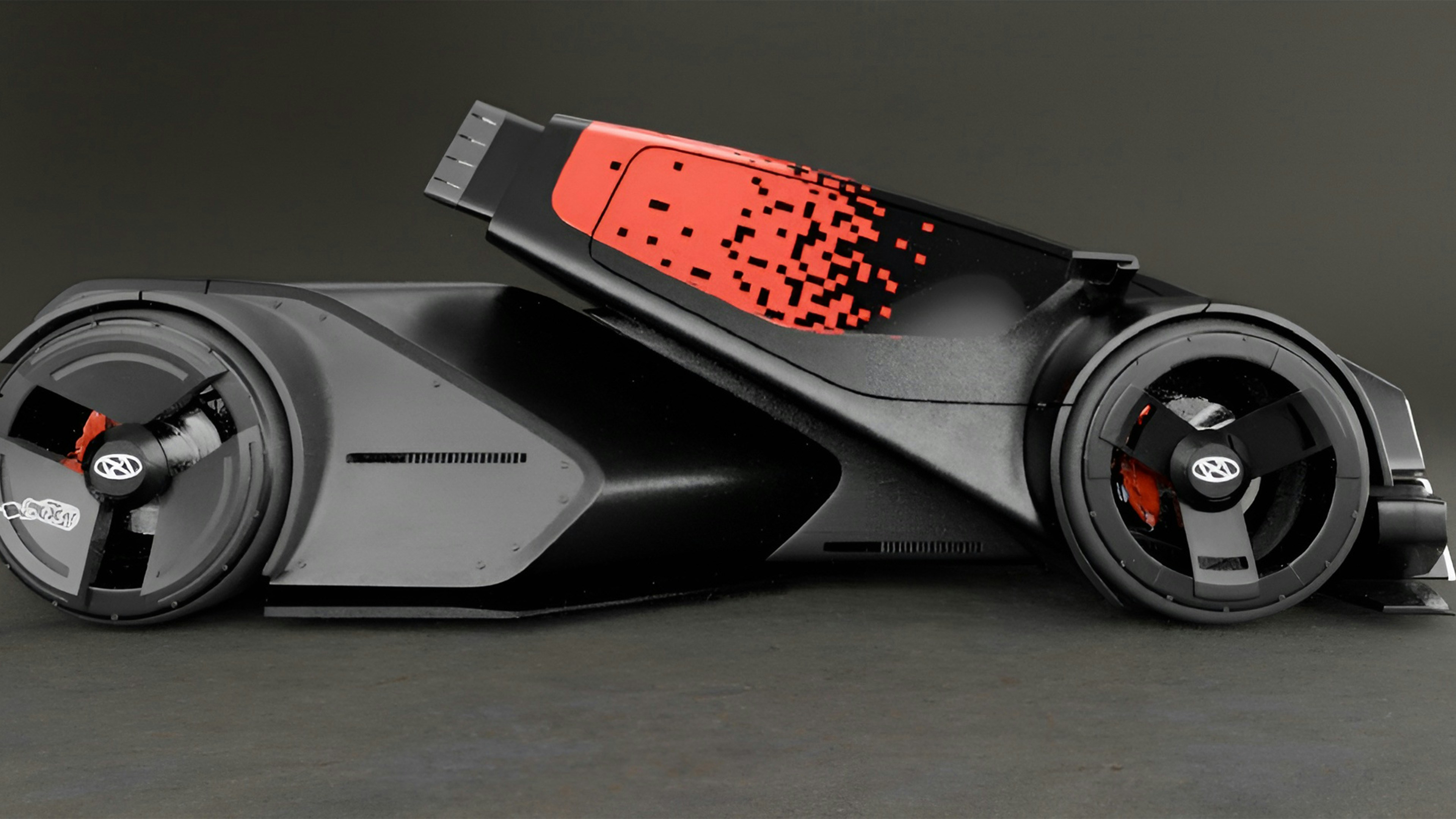 A futuristic black car with red accents