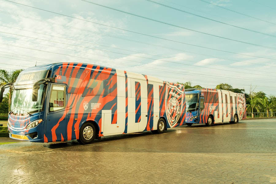 Fleet of branded logistics trucks parked at distribution hub