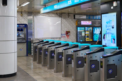 Automated turnstiles in a subway station entrance.