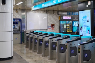Automated turnstiles in a subway station entrance.