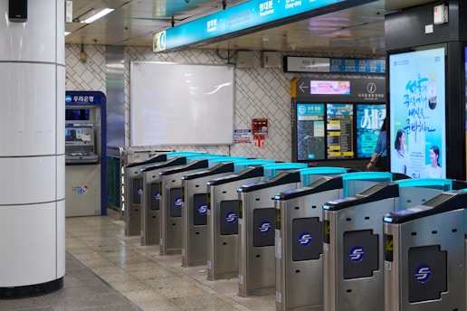 Automated turnstiles in a subway station entrance.