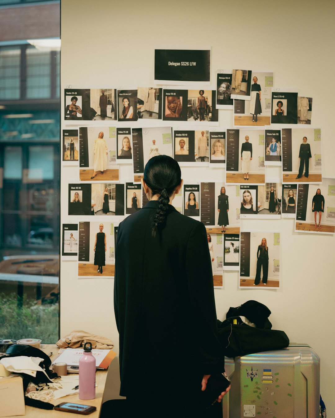 The designer having a look at her own job just before it's rolled out.