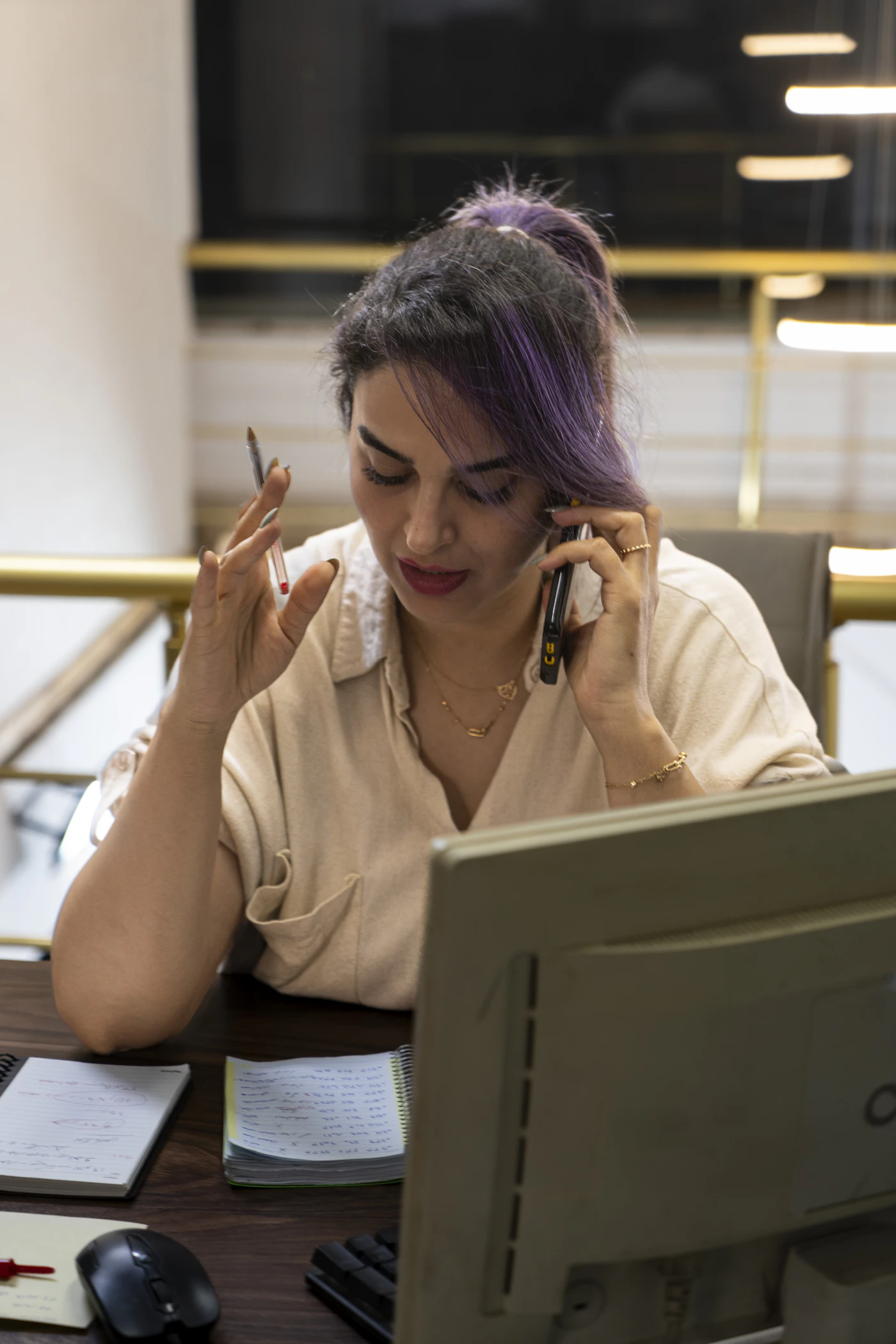 Business owner weighing call-handling decisions at a desk