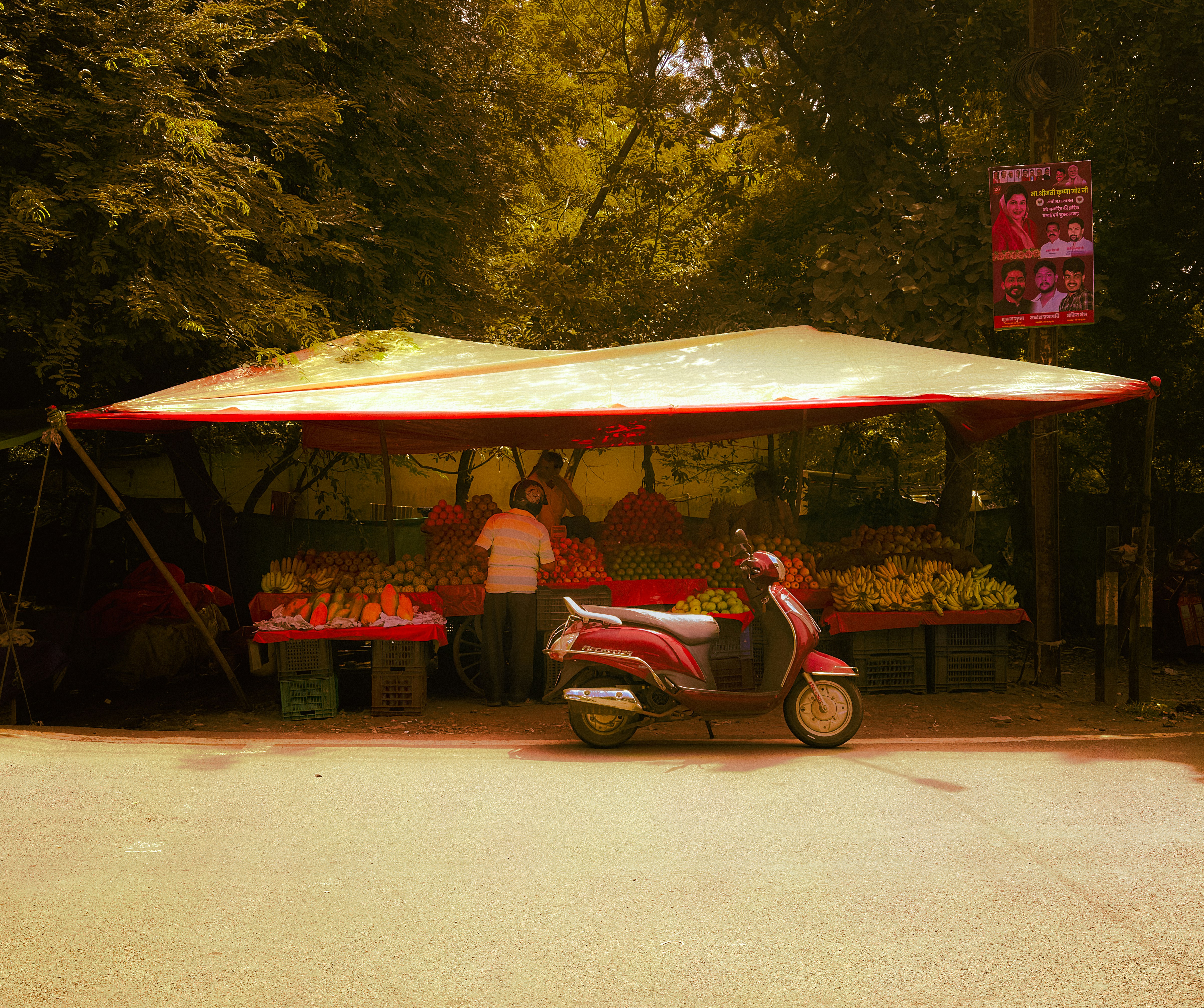 Golden hour stories from the streets. A quiet roadside fruit stall bathed in warm light - where simplicity meets color and life. Captured through the iPhone lens, turning an everyday scene into art.