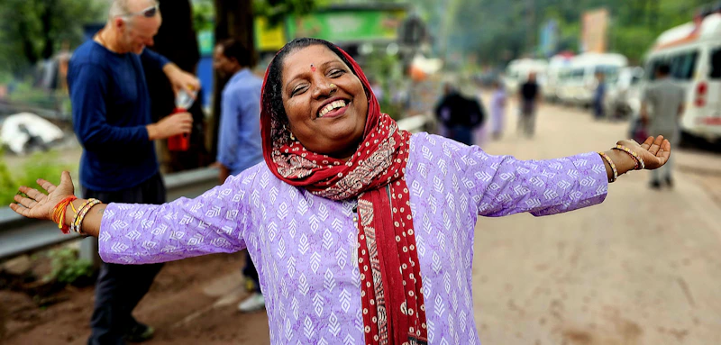 Joyful Indian sugar mummy embracing life outdoors