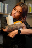 Woman hugging bottles of beauty products