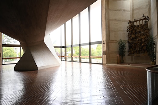Modern building interior with large windows and concrete structure