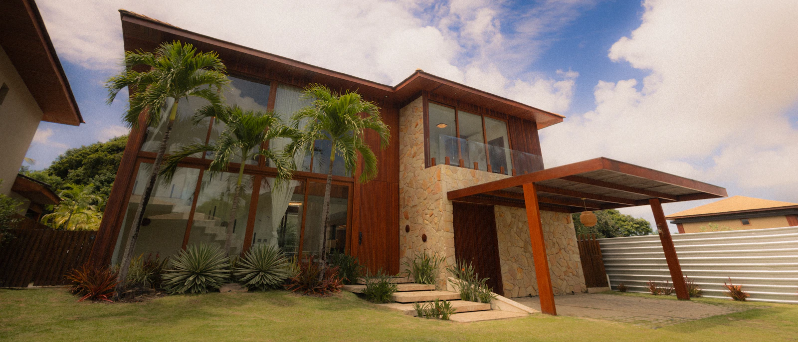 Contemporary house exterior with bold cladding composition