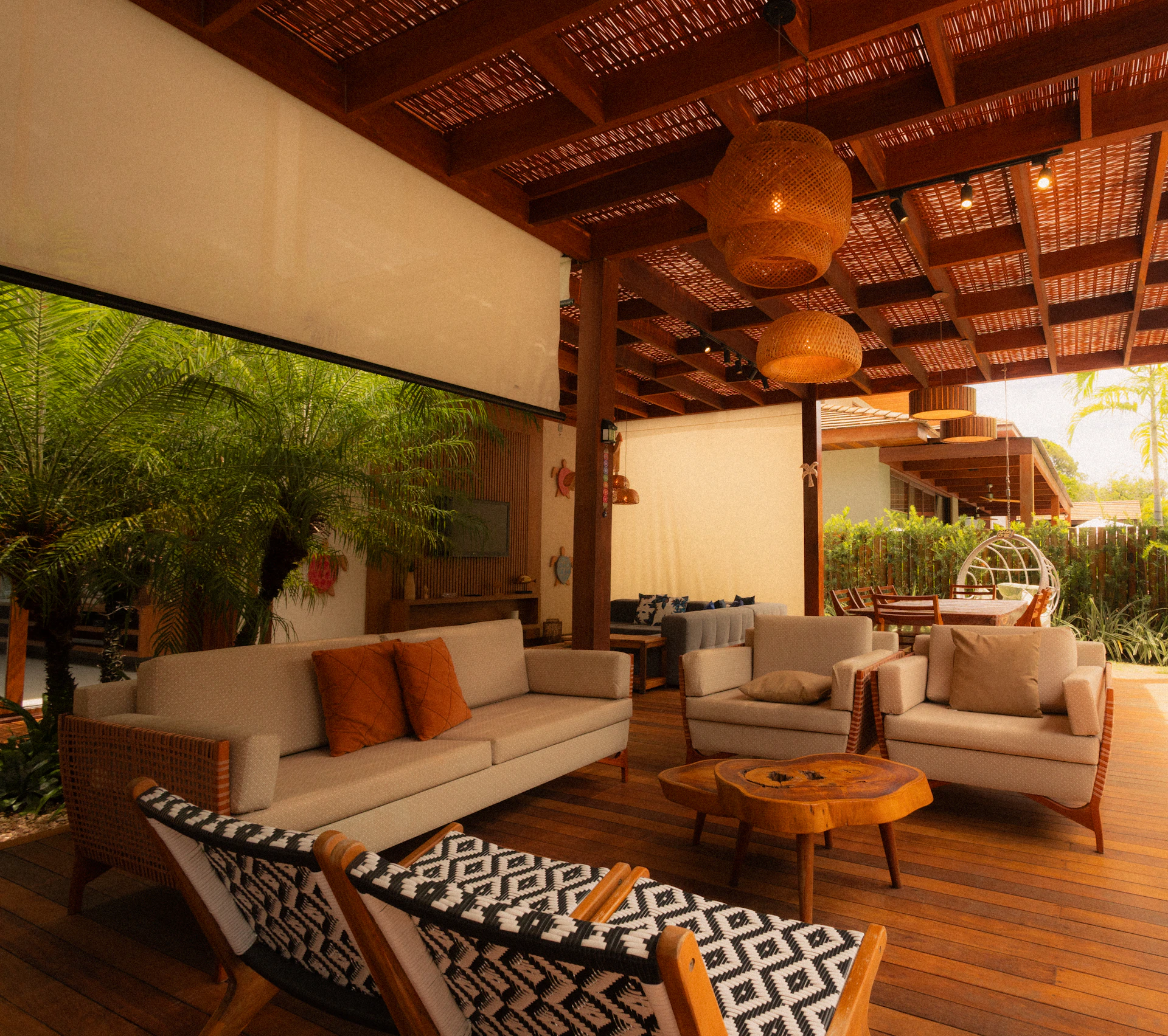 Outdoor lounge area with sofas and chairs