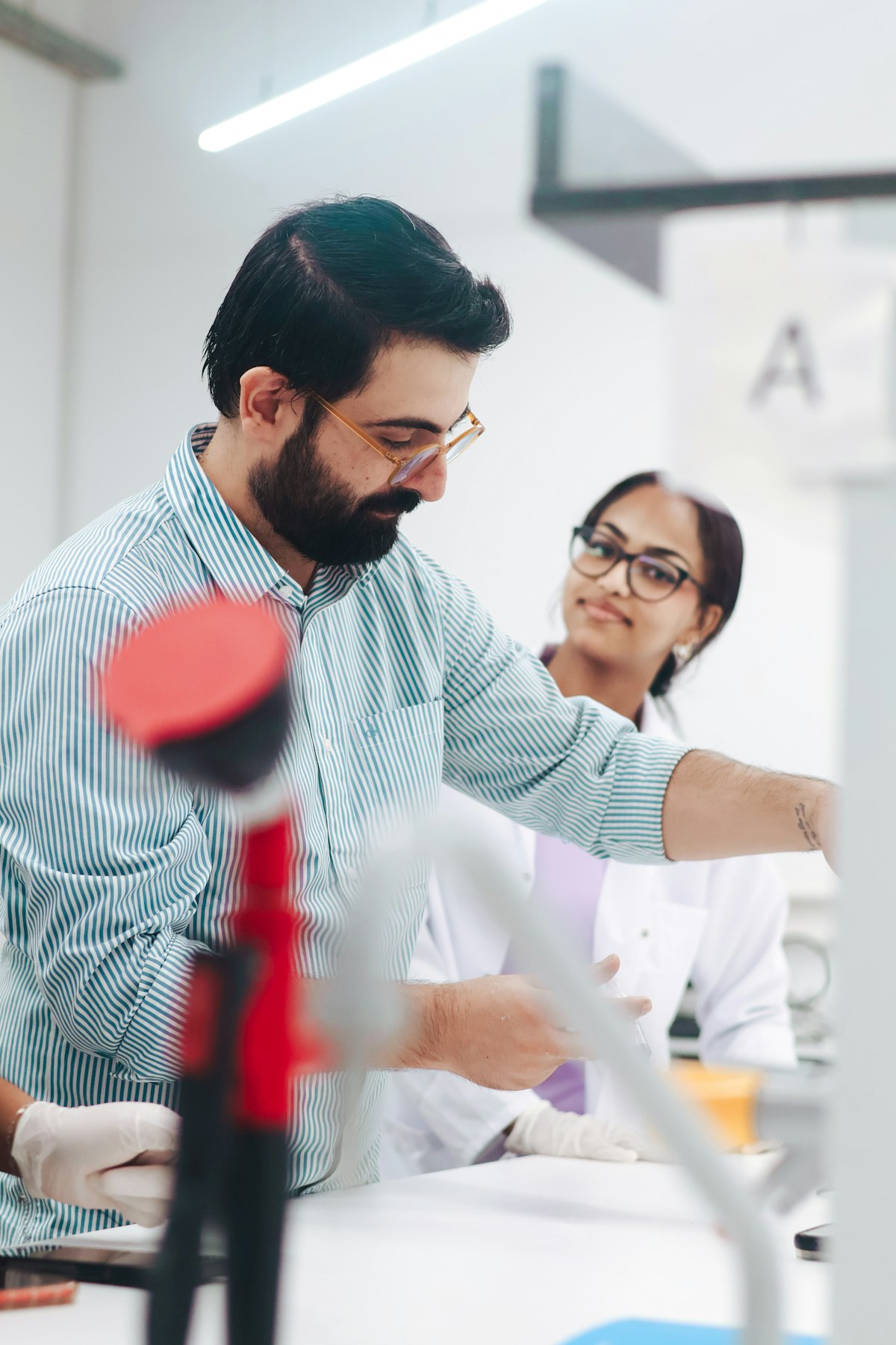 Scientists working together in a pharmaceutical research laboratory