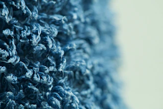 Close-up of textured blue fabric with soft lighting