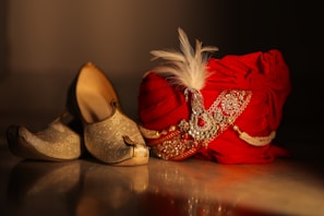 Ornate red turban and gold shoes