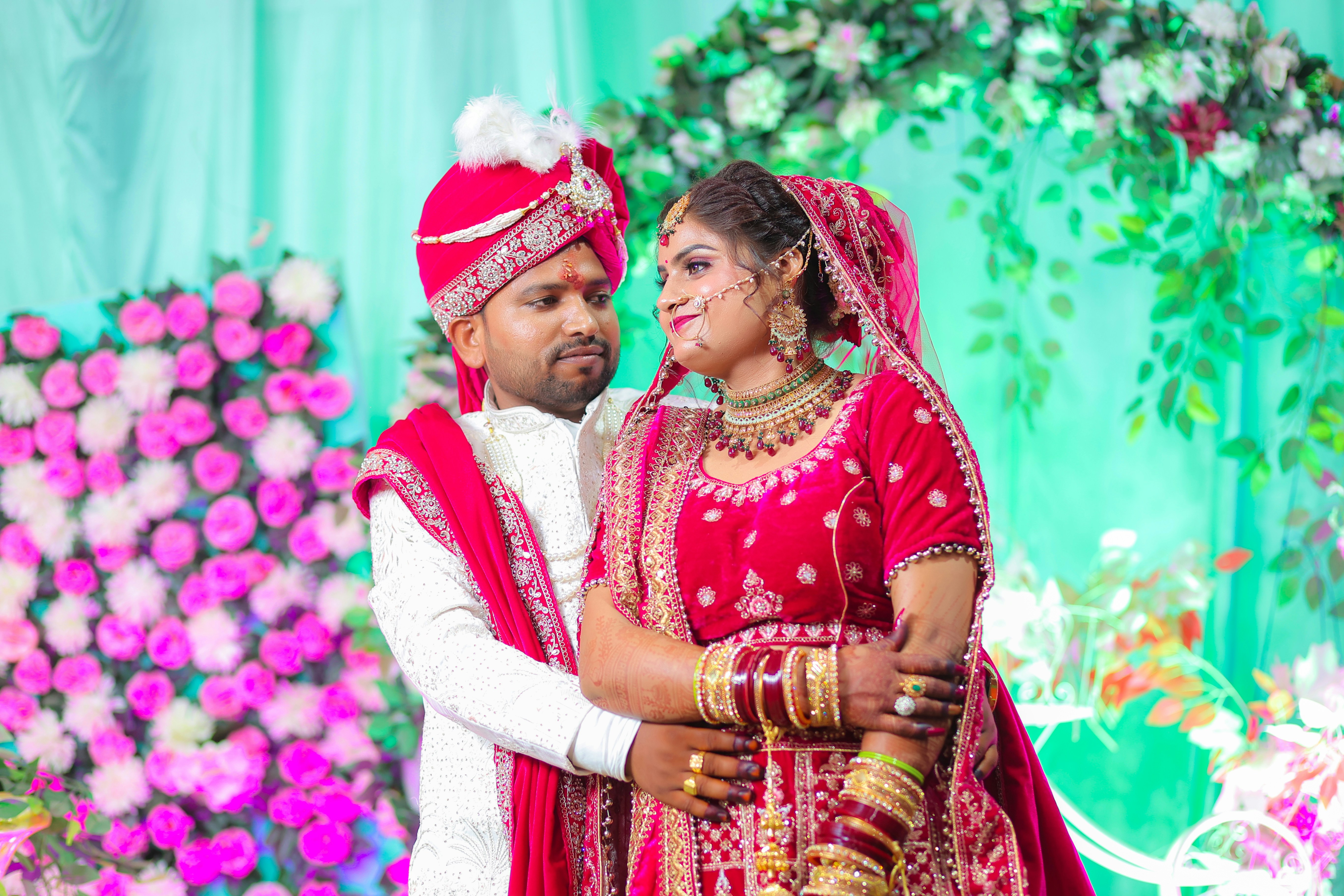 Newlyweds in traditional indian wedding attire