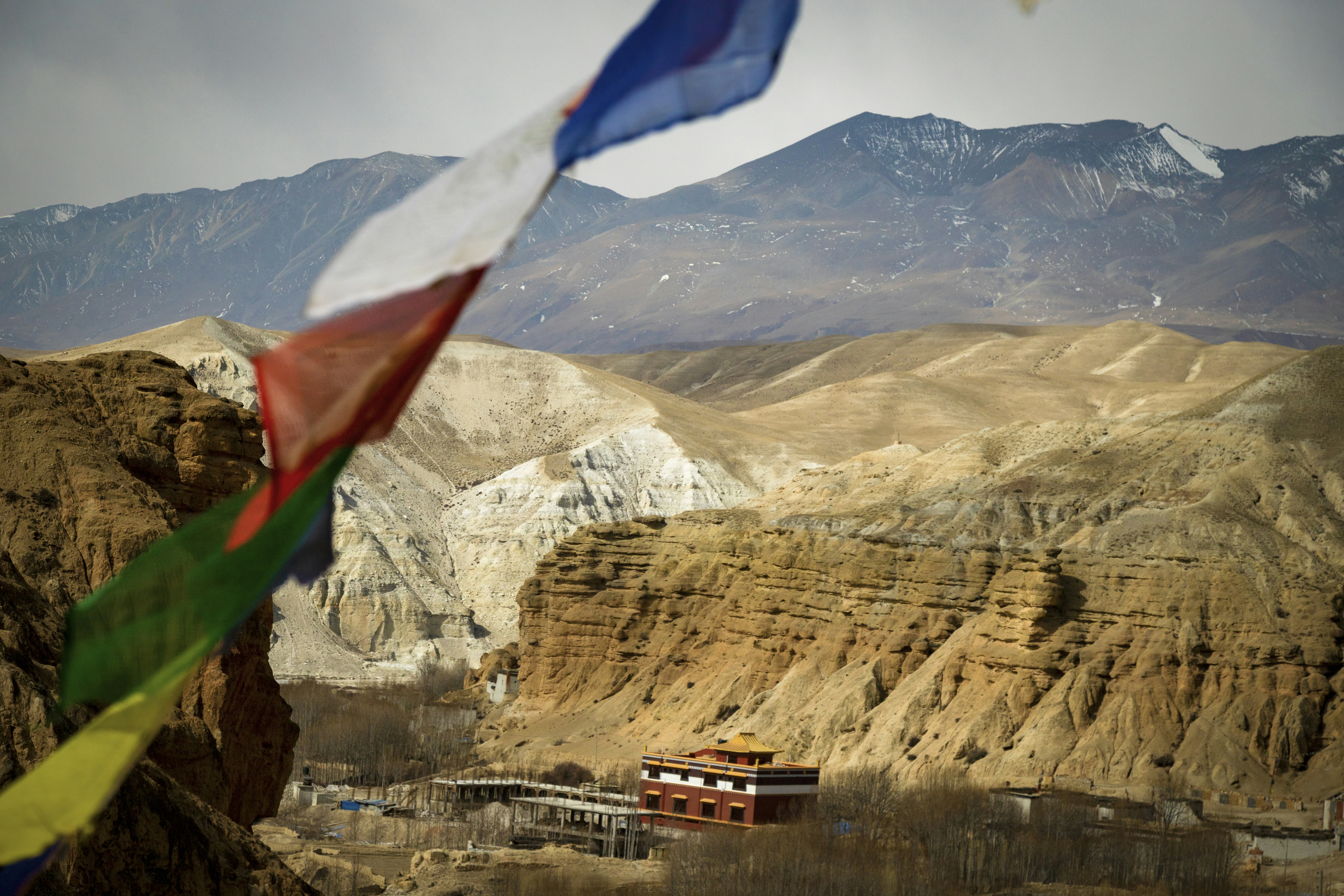 Discover Chhoser Cave in Lo Manthang, Mustang — ancient sky caves carved into cliffs, once used as shelters and meditation sites. A timeless glimpse into Nepal’s mystical Himalayan history