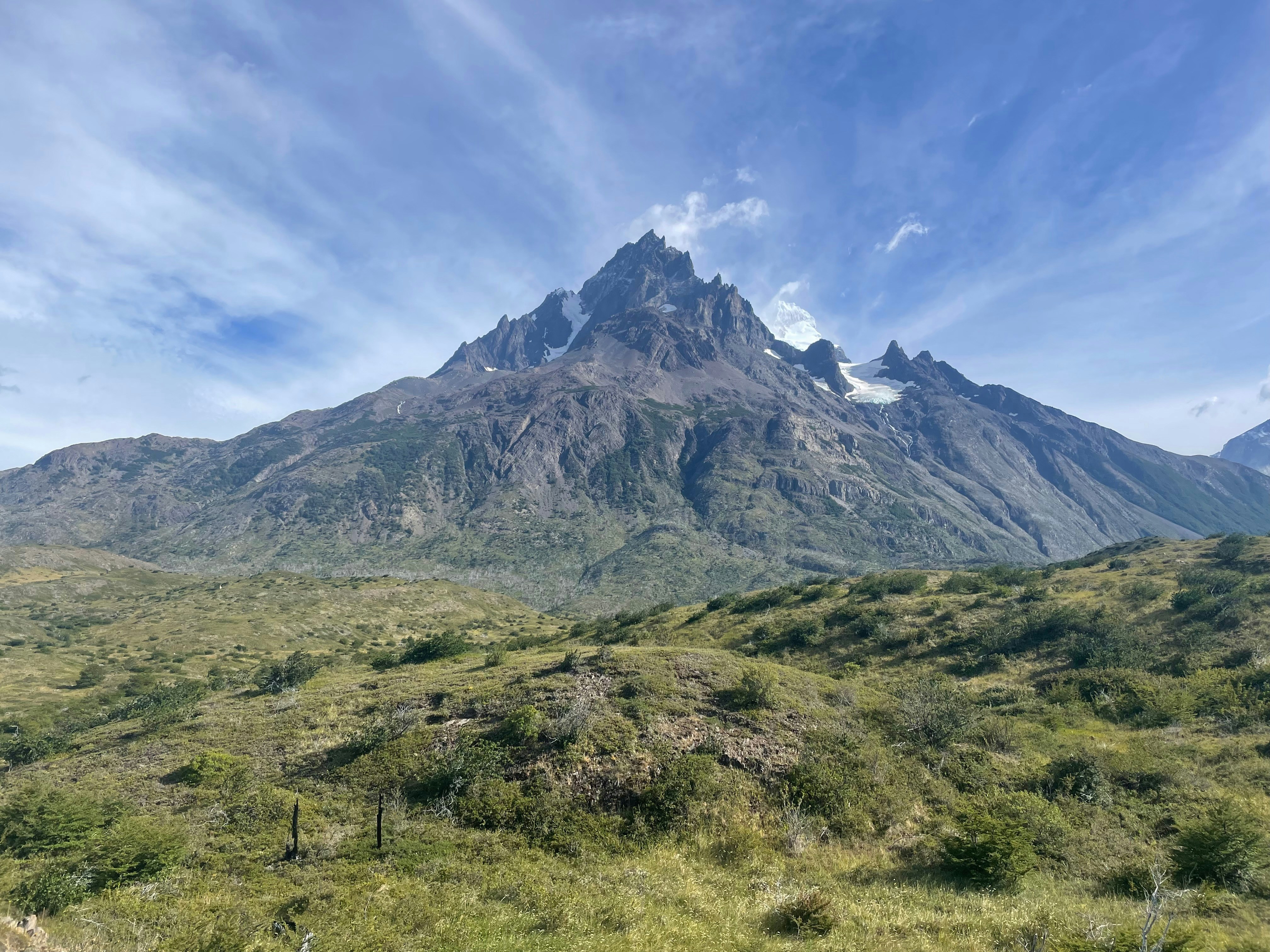 Majestic mountain peak under a vast blue sky