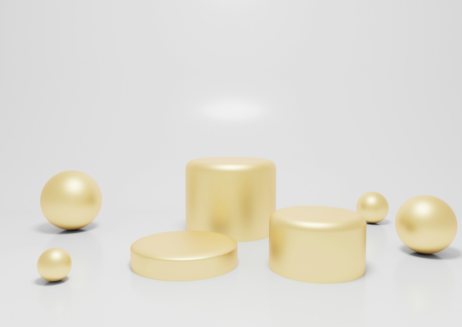 Golden spheres and cylinders on a white background