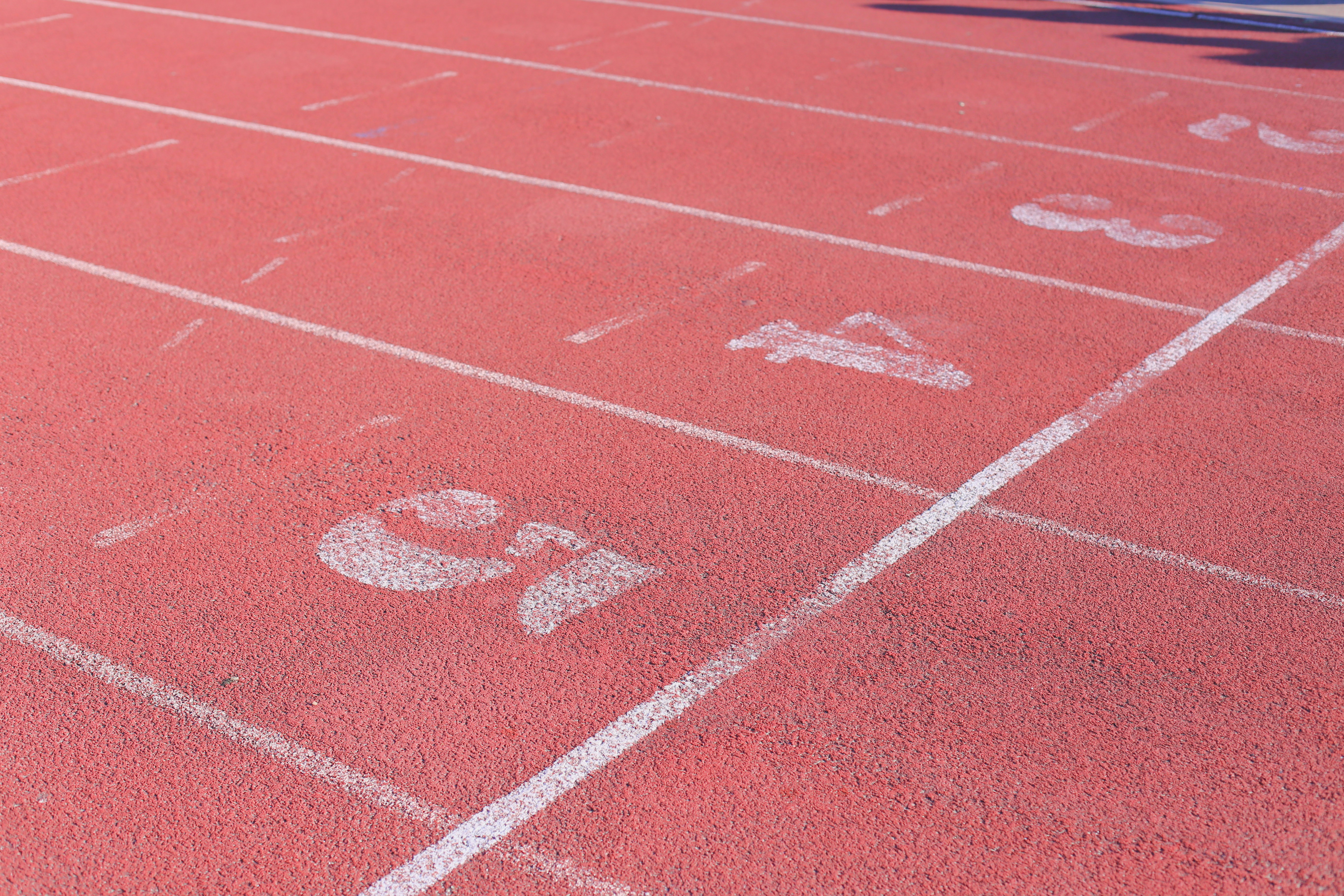 Running track lanes numbered five and four