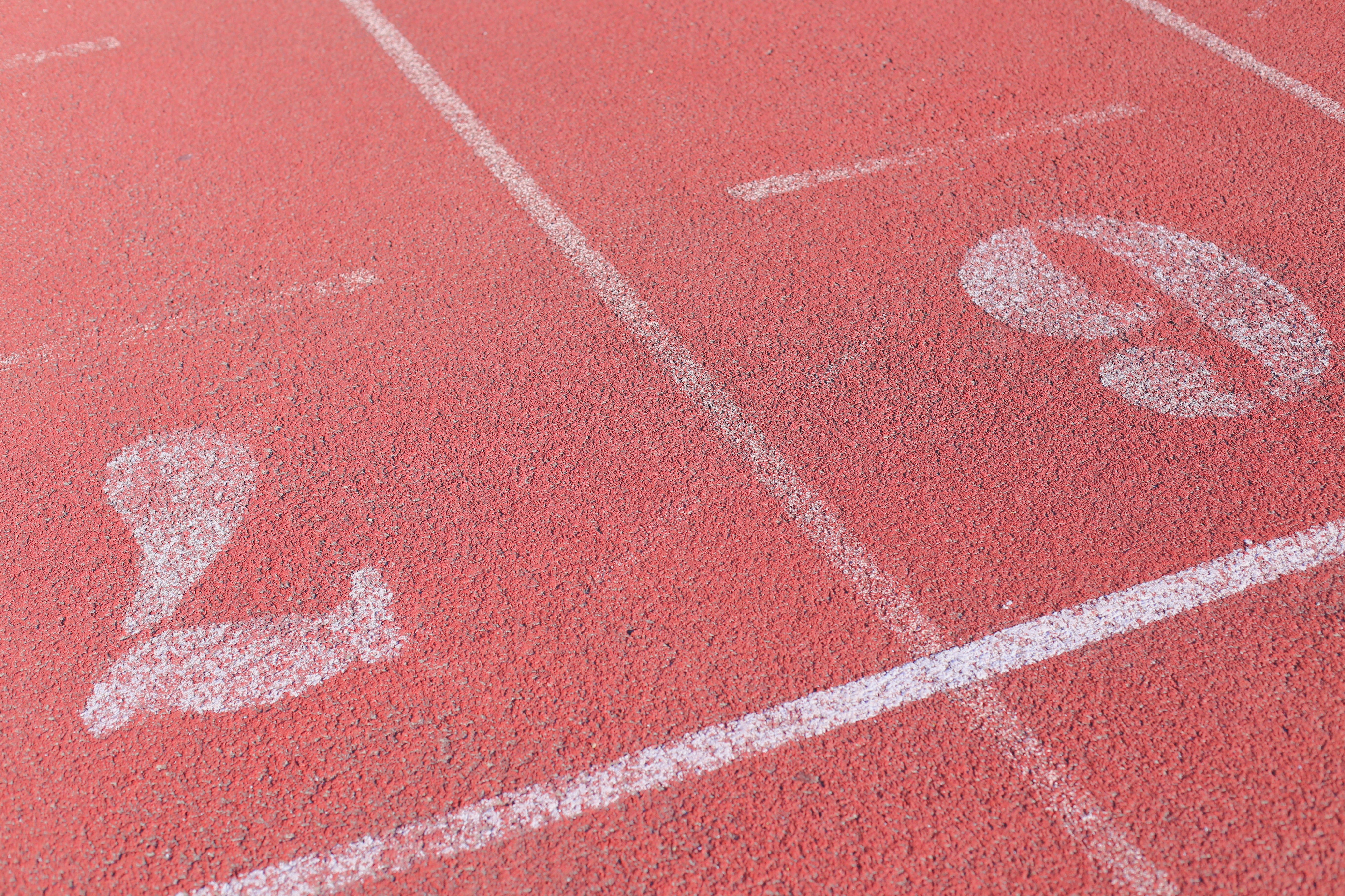 Running track lanes with numbers 7 and 9