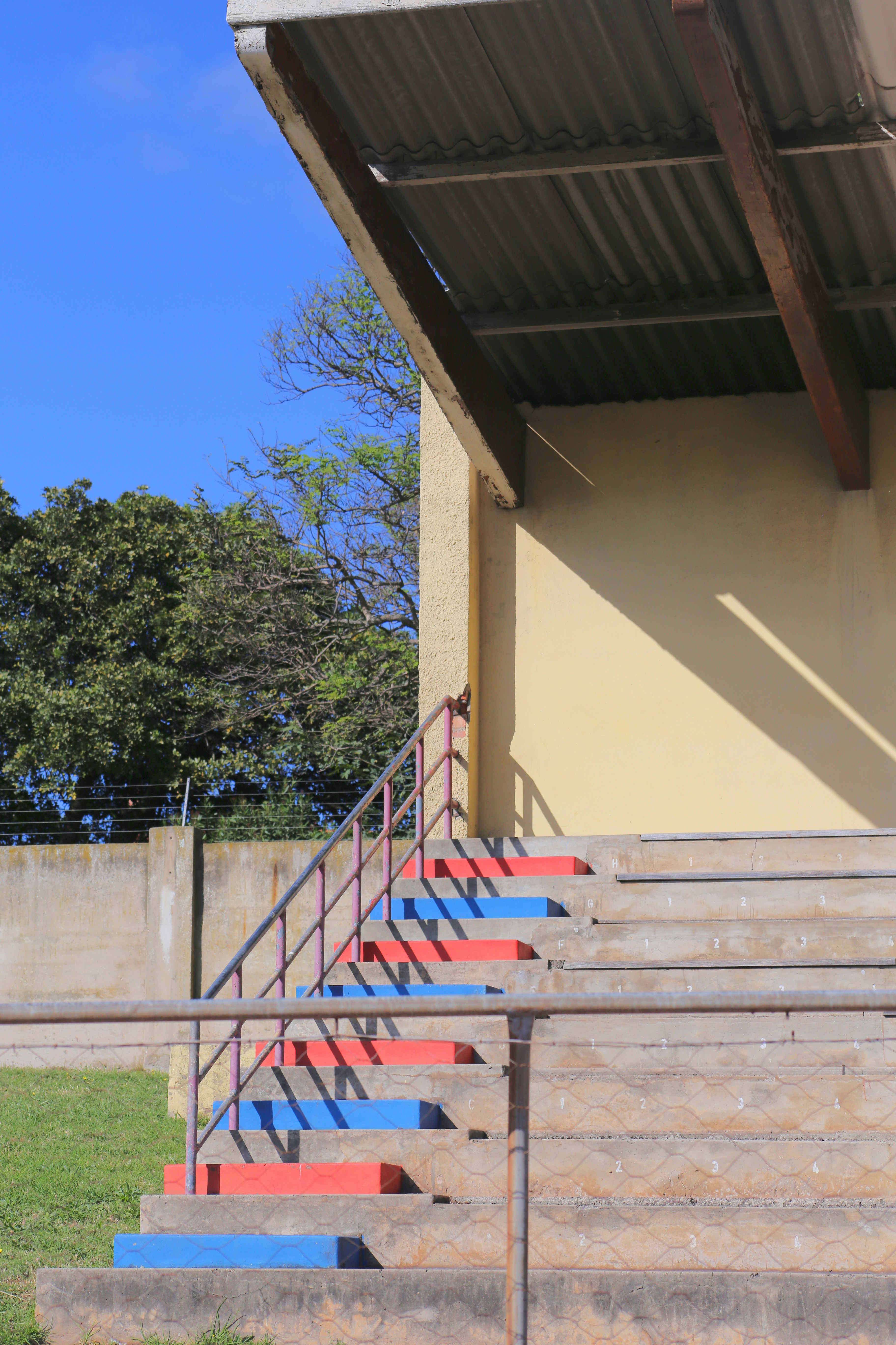 Bleacher stairs with red and blue steps