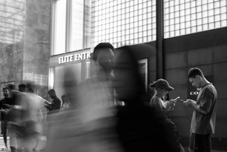 People walking in a blurred urban environment