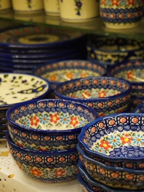 Stack of blue and white floral patterned ceramic bowls